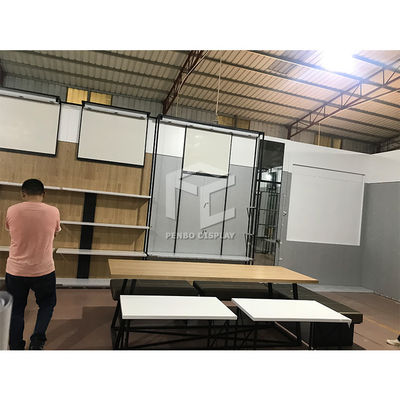 I vestiti di colore dell'oro visualizzano il materiale di acciaio inossidabile del compensato della mobilia del deposito